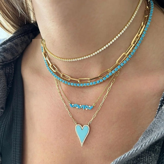 "Tennis necklace مطلي ذهب 18k مرصعة بحبيبات فيروزية – متوفرة في دبي وبيروت"