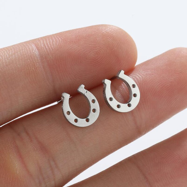 Horseshoe golden stud earrings