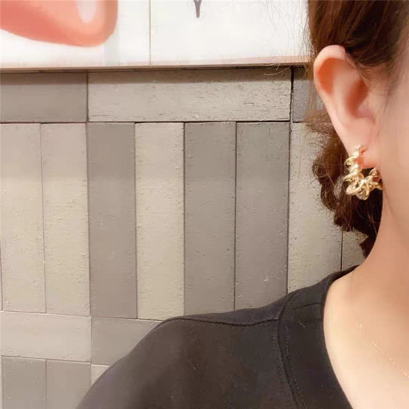 Twisted Gold hoops earrings